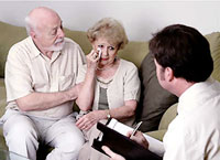Elderly Couple Receiving Therapy